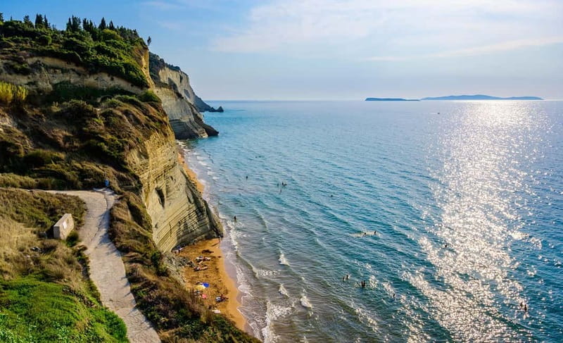 Corfu: Palaiokastritsa Swimming and Loggas Beach Sunset Tour - The guides make the long drives useful