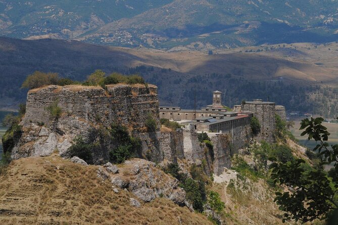 Day Tour of Gjirokastra & Blue Eye from Tirana or Durres - Gjirokastra Castle above the cobbled streets