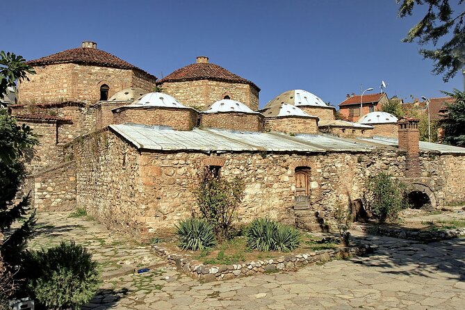 Private Kosovo Tour from Tirana: Prishtina & Prizren Highlights - City symbols around Prishtina’s center