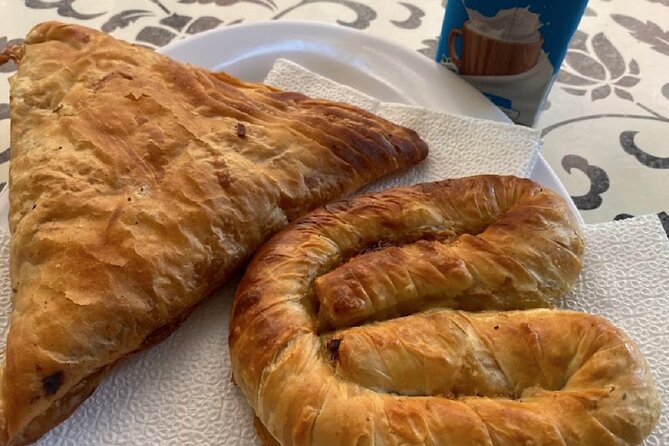 Tirana Guided Street Food Gems Tour (6 dishes, 1 sweet and drink) - The Orthodox Cathedral and Bank of Albania