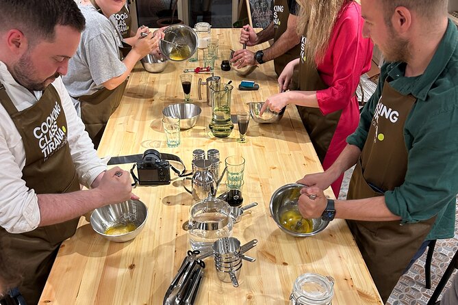 Traditional Albanian Cooking Class in Tirana with Raki Tasting - Meze, raki, and the welcome table